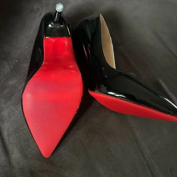 Black patent leather, high heels with red bottom.I get so many compliments