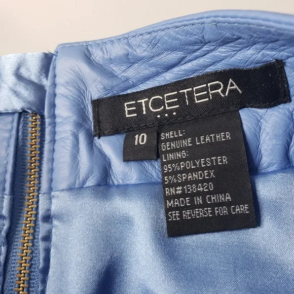 Etcetera Leather Laser Cut Perforated Studded Exposed Zipper Front Pockets Skirt