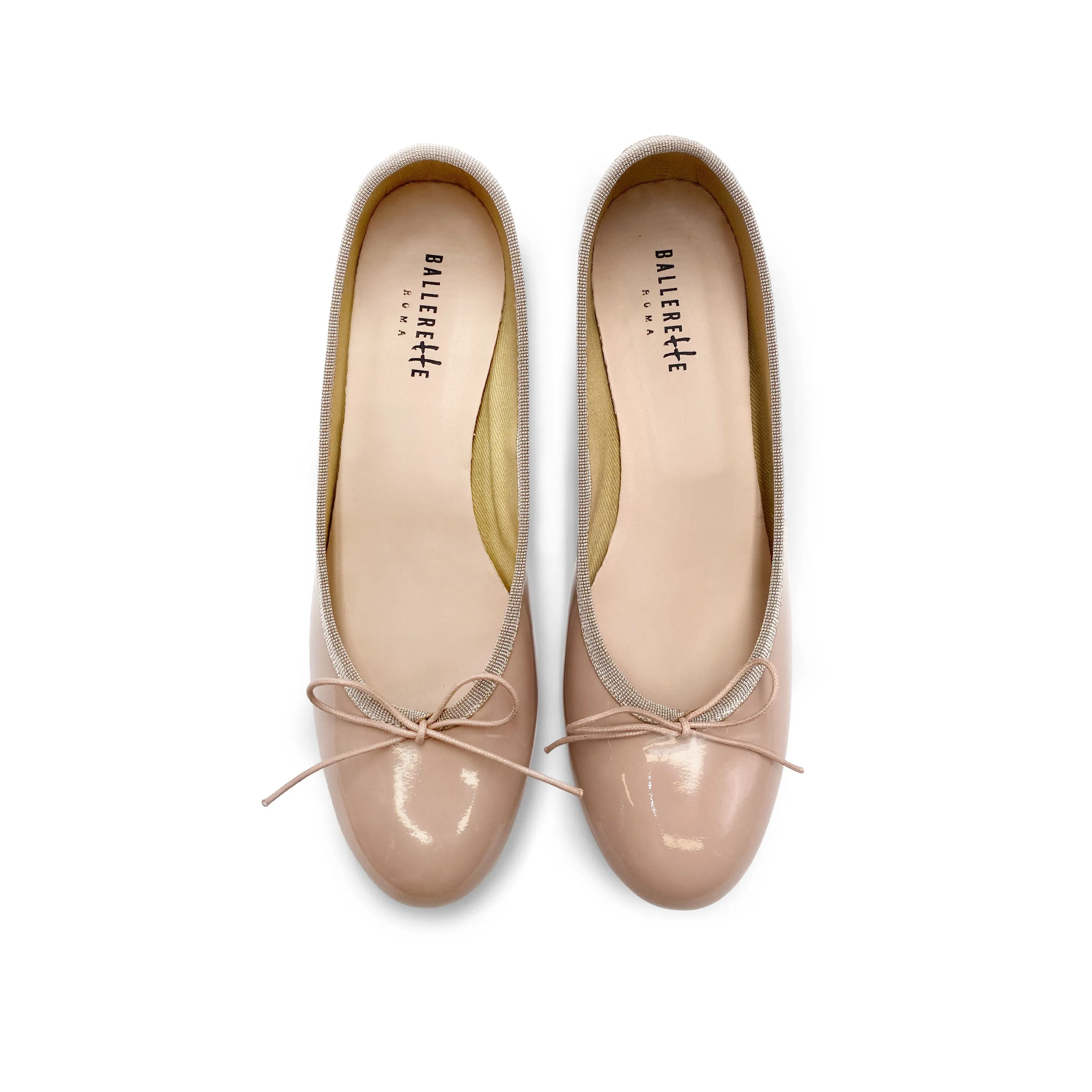 Powder pink patent leather ballet flats with heel