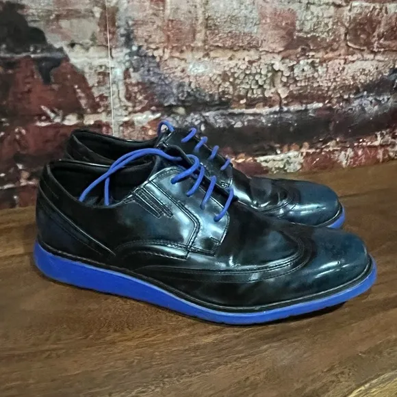 PREOWNED Rockport Men’s Wingtip Oxford Black and Blue Leather, Size 10